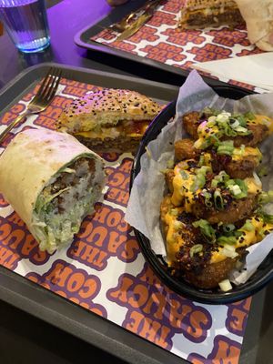 Caesar wrap, double cheeseburger, salt and chilli hash browns   at The Saucy Cow in Dublin