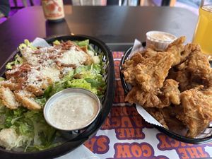Caesar salad and fried mushrooms  at The Saucy Cow in Dublin