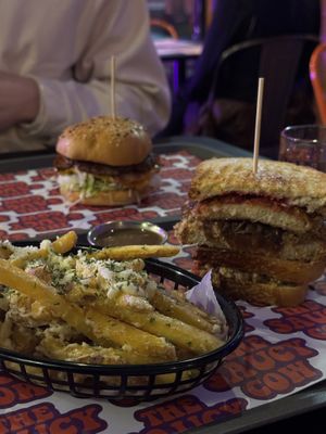 Parmesan fries, holiday sandwich and classic burger w pickles instead of tomatoes 👏🏽  at The Saucy Cow in Dublin