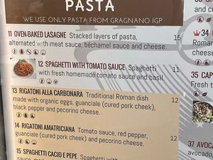 Pasta menu with one vegan dish; the Spaghetti with tomato sauce (July 2023) at Caffe Washington in Rome