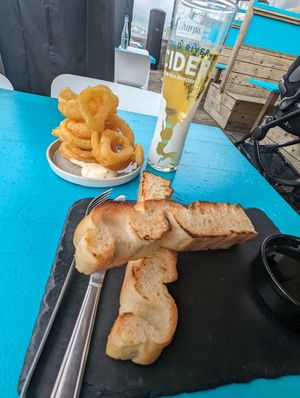 Vegan focaccia and onion rings with vegan aioli at Southsea Beach Cafe in Southsea