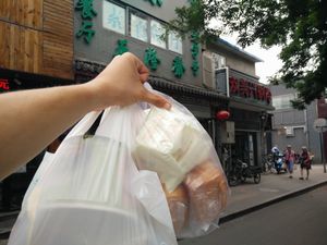this is how I left the place! (the store is the one with green letters) at Beijing Zheng Long Zhai in Beijing