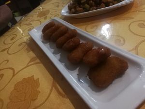 You gotta order the chicken nuggets at Beijing Zheng Long Zhai in Beijing