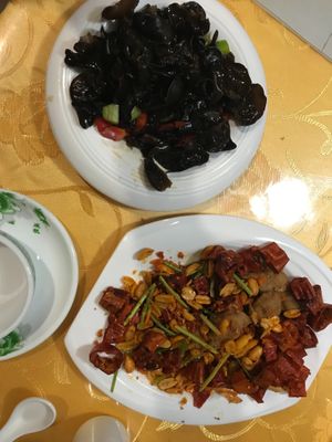 Amazing food.   Black fungus salad (top) and chillies and peanuts (amazing!) at Beijing Zheng Long Zhai in Beijing