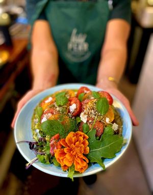 Smashed Avocado, Wild Weed Pesto, Tomatoes, Hemp Seed Dakha, Sunflower & Pumpkin Seeds drizzled with Avocado oil at Wild Pear Kitchen in New Plymouth