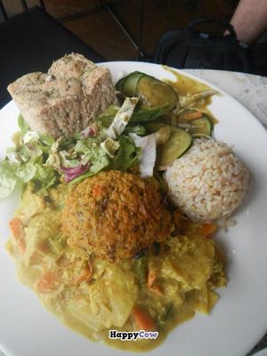Vegan vegetable curry with lentil burger, rice, salad, and bread at Graenn Kostur in Reykjavik