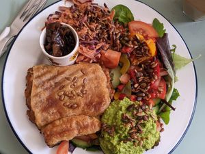 Sausage roll, salad and added smashed peas at Root in Hythe
