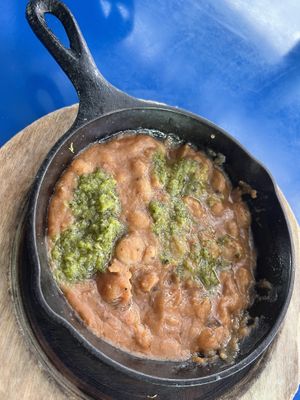 veganized refried heirloom beans by removing the queso fresco  at Mister Oso in Denver