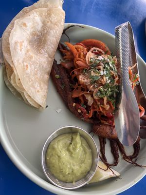 carrot barbacoa tacos made with roasted and smoked baby carrots, barbacoa marinade, crunchy carrot slaw, crispy shallots, and salsa verde  at Mister Oso in Denver