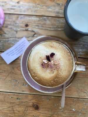 Oat latte with a cute intentional message for the day 🥰  at VIBE Plant Based Cafe & Restaurant in Douglas