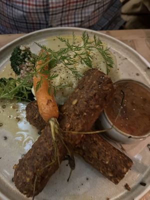 Homemade bangers & mash, perfect comfort food  at VIBE Plant Based Cafe & Restaurant in Douglas