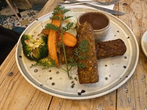 Sausage and mash   at VIBE Plant Based Cafe & Restaurant in Douglas