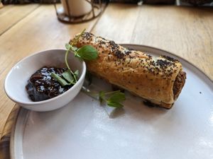 Sausage roll with chutney at VIBE Plant Based Cafe & Restaurant in Douglas
