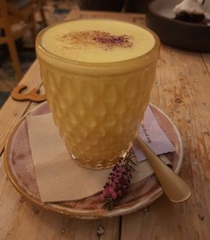 Turmeric latte at VIBE Plant Based Cafe & Restaurant in Douglas