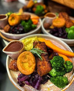 Butternut squash, date and nut roast available on Sundays   at VIBE Plant Based Cafe & Restaurant in Douglas