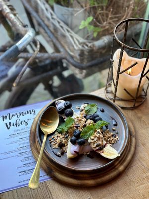 Banana & blueberry split with house granola, yogurt & blueberry coulis at VIBE Plant Based Cafe & Restaurant in Douglas