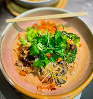 Peanut & sesame noodle bowl dinner menu   at VIBE Plant Based Cafe & Restaurant in Douglas