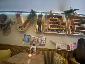 Vibe bookshelves in the interiorr  at VIBE Plant Based Cafe & Restaurant in Douglas