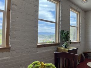 Enjoying my blissful looking out at the window from the upstairs tea house! Delicious healthy vegan vegetarian foods!  at The Wild Violet in Mars Hill