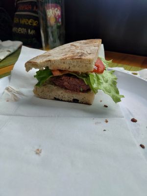 Half the portion of the vegan burger (one burger in each half) at Faísca in Santana