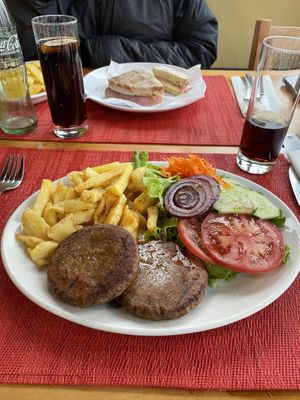 Vegan burger on the plate   at Faísca in Santana