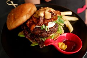 Latest addition to our vegan offerings - VEGAN 'BLACK ANGUS' BURGER with home-made bun, home-made patty (from brown rice, walnut, portobello, flaxseed ...), home-made bacon & sauce at Moto Laurie in Da Lat