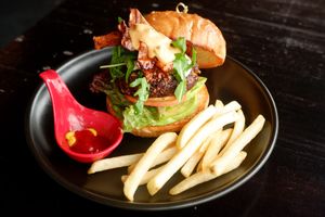Latest addition to our vegan offerings - VEGAN 'BLACK ANGUS' BURGER with home-made bun, home-made patty (from brown rice, walnut, portobello, flaxseed ...), home-made bacon & sauce at Moto Laurie in Da Lat