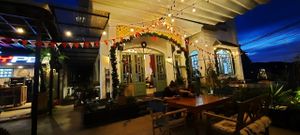 The frontage of our restaurant at night, with some Christmas decoration being put up. at Moto Laurie in Da Lat