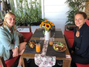 Our vegan customers with our 2 vegan signature dishes, Buddha Bowl and Ultimate Avocado Sandwich. at Moto Laurie in Da Lat