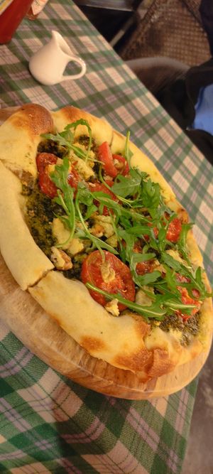 Vegan pizza pesto with vegan cheesse at Moto Laurie in Da Lat