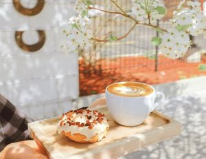 Almond Milk Cappuccino + Maple “Bacon” Donut  at Rockford Roasting Company in Rockford