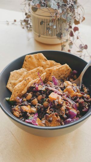 Plant-based grain bowl w/ lentils, roasted sweet potato, cabbage, and chickpeas—served w/ a side of vegan + gf crackers. at Rockford Roasting Company in Rockford