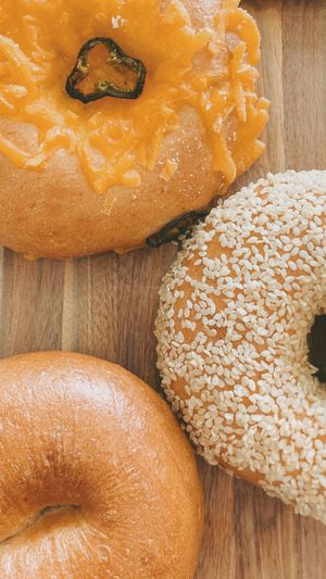Bagels—plain, sesame, and plant-based cheddar + jalapeno at Rockford Roasting Company in Rockford