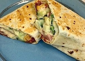 Hummus Wrap
Homemade hummus, on burrito, with artichoke hearts, sun dried tomatoes, tomatoes, cucumber. at Java Dive Organic Cafe - Mediterranean Restaurant in Bee Cave