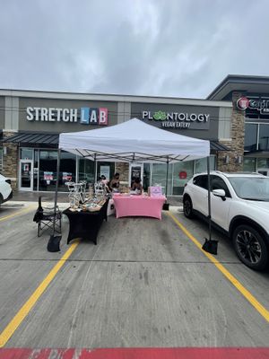 Outside with vendor market set up  at Plantology  in San Antonio