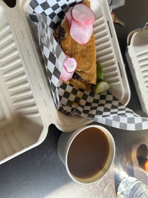 Order of 2 quesabirria tacos with consume  at Viva Vegan in Colton