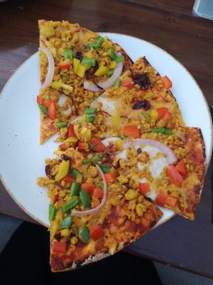 Half of the No Meat Pizza (spicy) at The Green Affair in Mumbai
