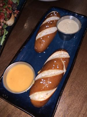 pretzels with vegan cheese dip and dijon mustard  at Idlewild Spirits Brewpub and Restaurant in Winter Park