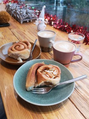 Apple and almond foreground, plain sugared background. Oat flat whites. at Hey Schnecke in Berlin