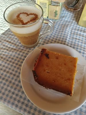 Vegan Cheesecake & Oat Latte at Tom's Pan German Bakery in Nuevo Arenal