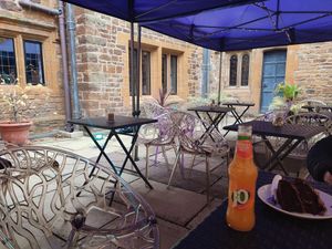 Outdoor seating - courtyard at World Peace Cafe in Northampton