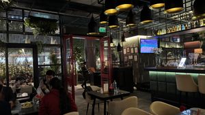 Dining area, bar, and patio  at The Kylin Experience in New Delhi