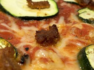 The Bandolera - Tomato, vegan mozzarella, courgette and vegetable sausage.  at Sabriona Pizzeria in Girona
