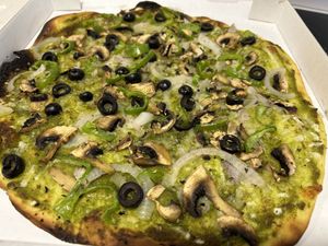 The Foresta - Pesto sauce, vegan mozzarella, mushrooms, black olives, green pepper and Figueres onion.  at Sabriona Pizzeria in Girona