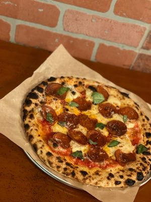 Definitely a must-try if and when you’re in Orlando! This is the Planet Pepperoni with red sauce, cashew mozz, plant-based roni, and fresh basil!  at Project Nova Pizza Company in Apopka