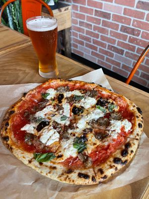 Meatball mothership featuring tofu ricotta, cashew mozz, red sauce, fresh basil, and impossible meatballs ! This is one of the best pizzas I’ve ever had!  at Project Nova Pizza Company in Apopka