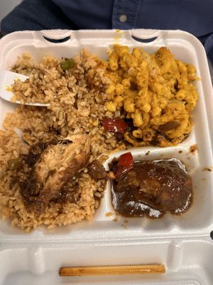 Curry chicken, rice and peas, Mac n cheez  at Di-Vine Plant Based Cuisine in Forest Park