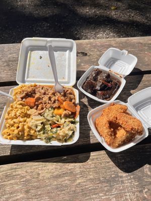 Orange soy chickun, mac n cheese, cabbage. Soy jerk Drumstick , and crispy fried chickin   at Di-Vine Plant Based Cuisine in Forest Park