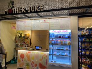 Sign, drink case, wall menu at Mother Juice - High St Place in Boston