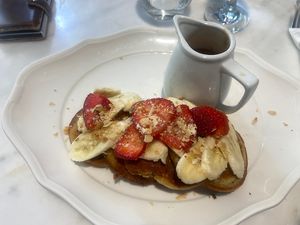Protein pancakes with fruit, maple syrup and (a lot of) peanut butter (in the little can)   at Zampano in Athens